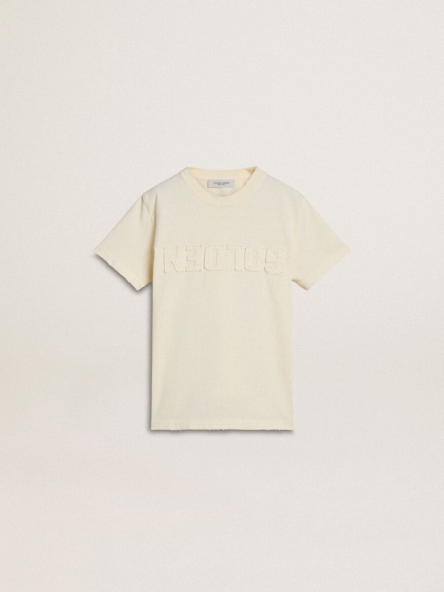 camiseta de niño color crema con logo en relieve