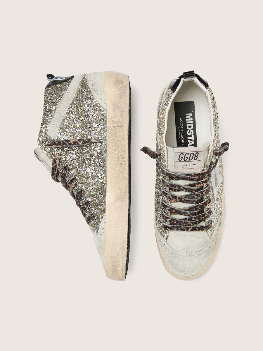 mid star en brillo plateado con estrella de cuero metalizado plateado
