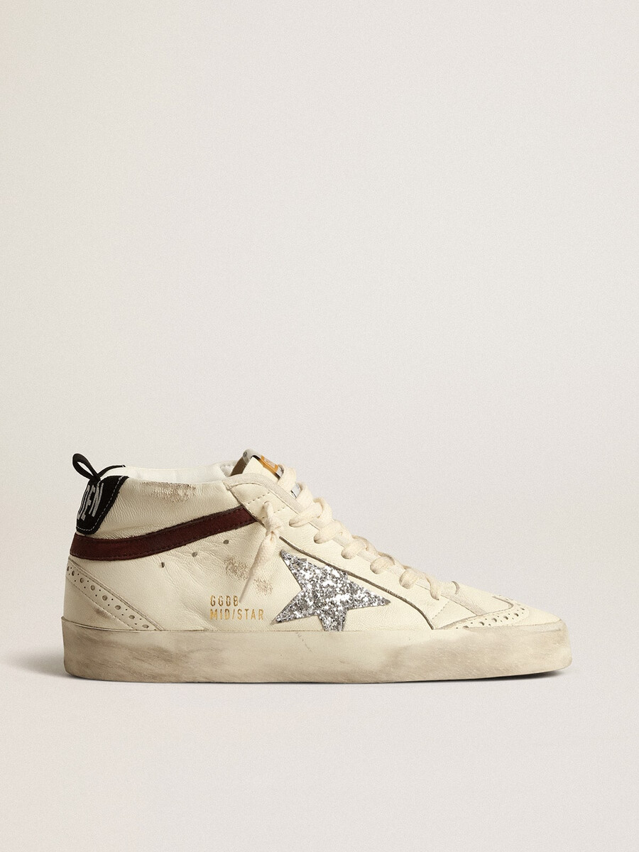 mid star ltd en piel napa blanca con estrella plateada brillante