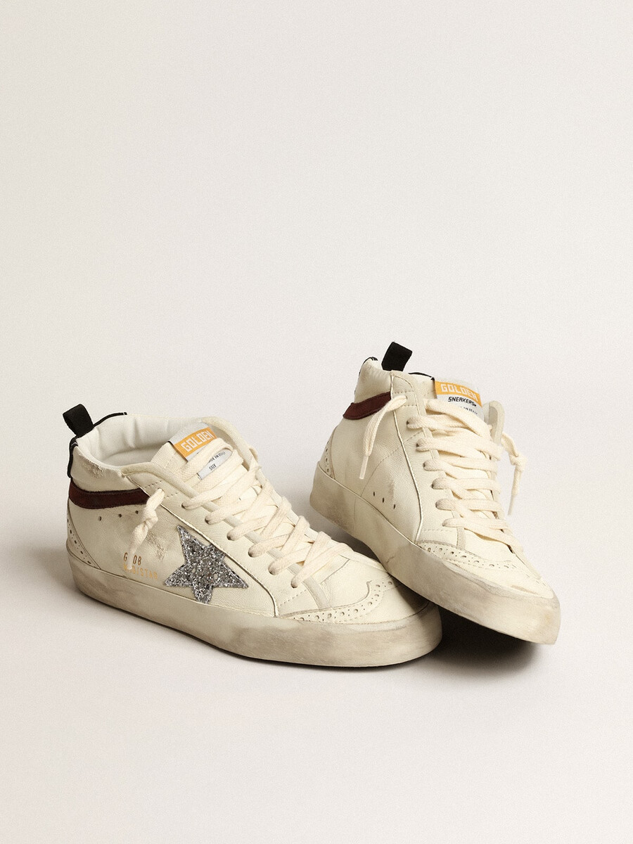mid star ltd en piel napa blanca con estrella plateada brillante