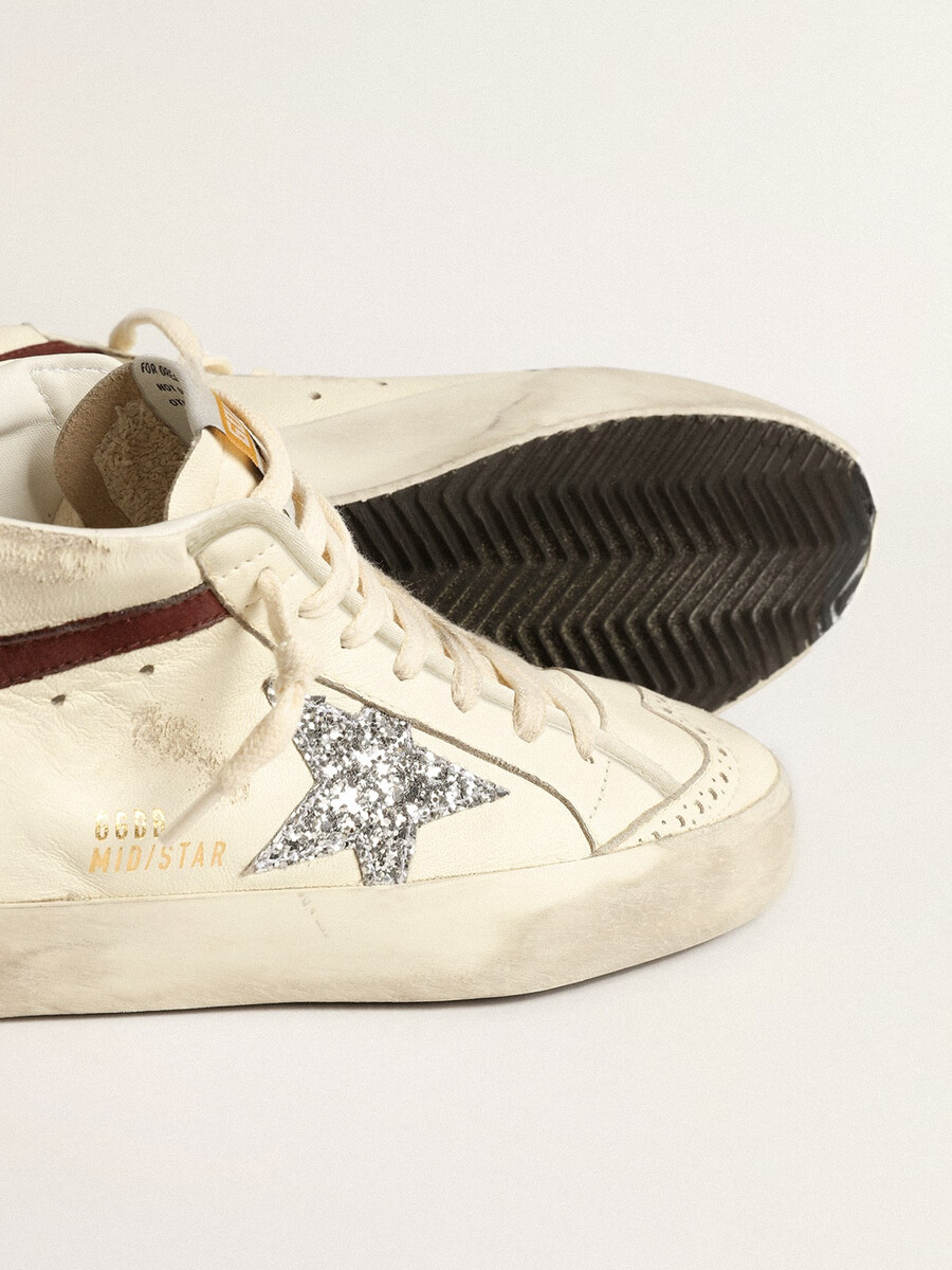 mid star ltd en piel napa blanca con estrella plateada brillante
