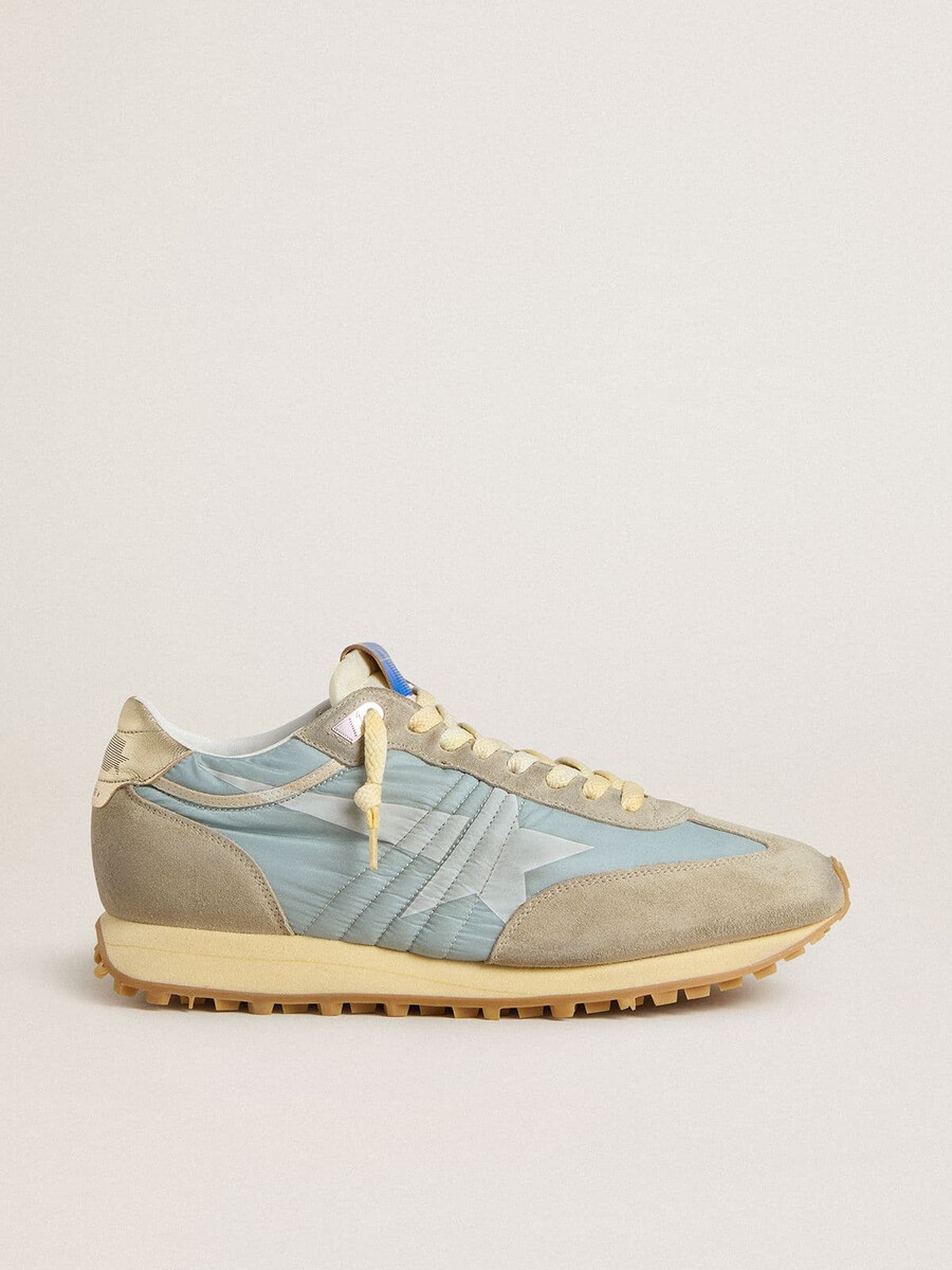 maratón para hombre con parte superior de nailon azul claro y estrella azul pastel
